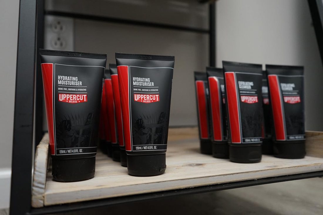 Uppercut Deluxe moisturiser and cleanser on the product shelf